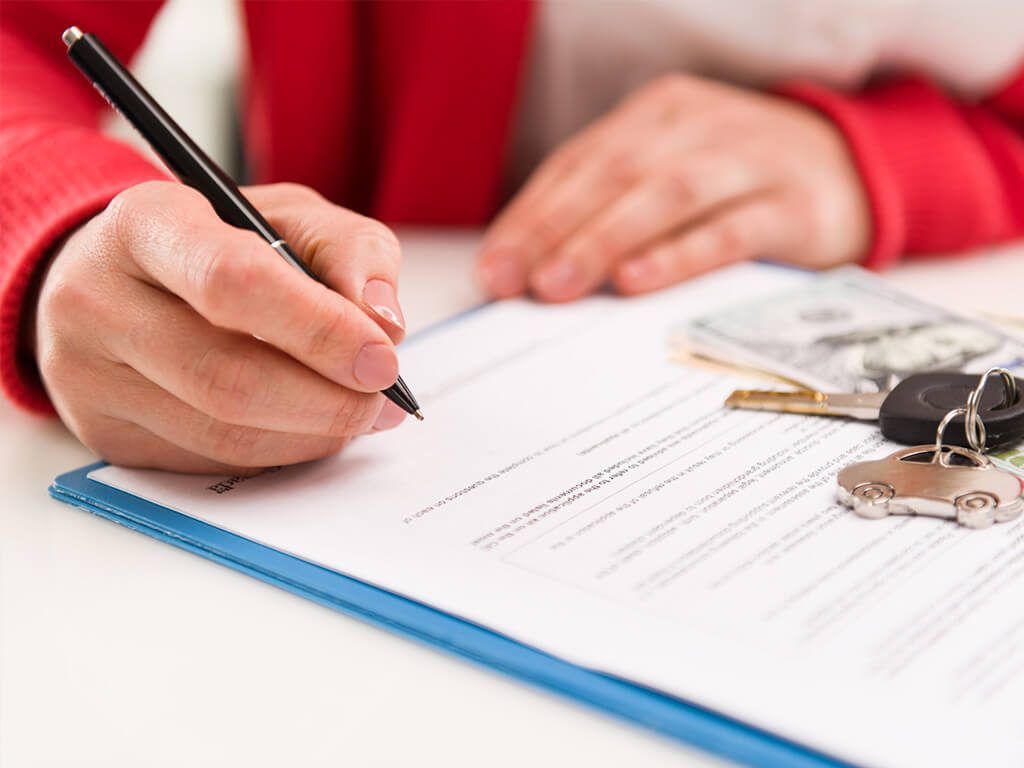 Red Woman Signing Important Paper And Keys